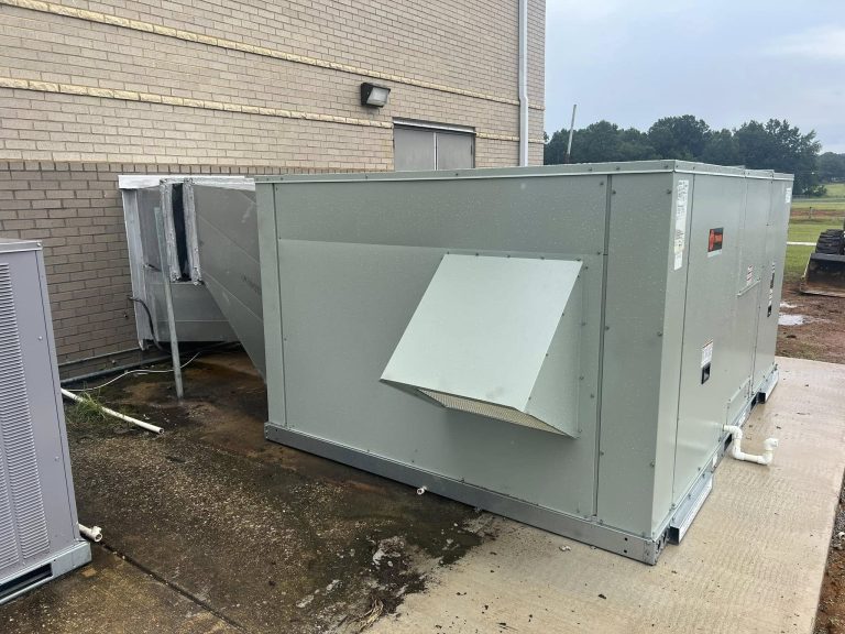 Commercial rooftop-style unit installed beside a building