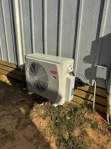 Mini-split outdoor unit on a metal building